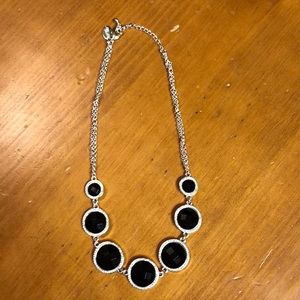 Women’s black and silver necklace